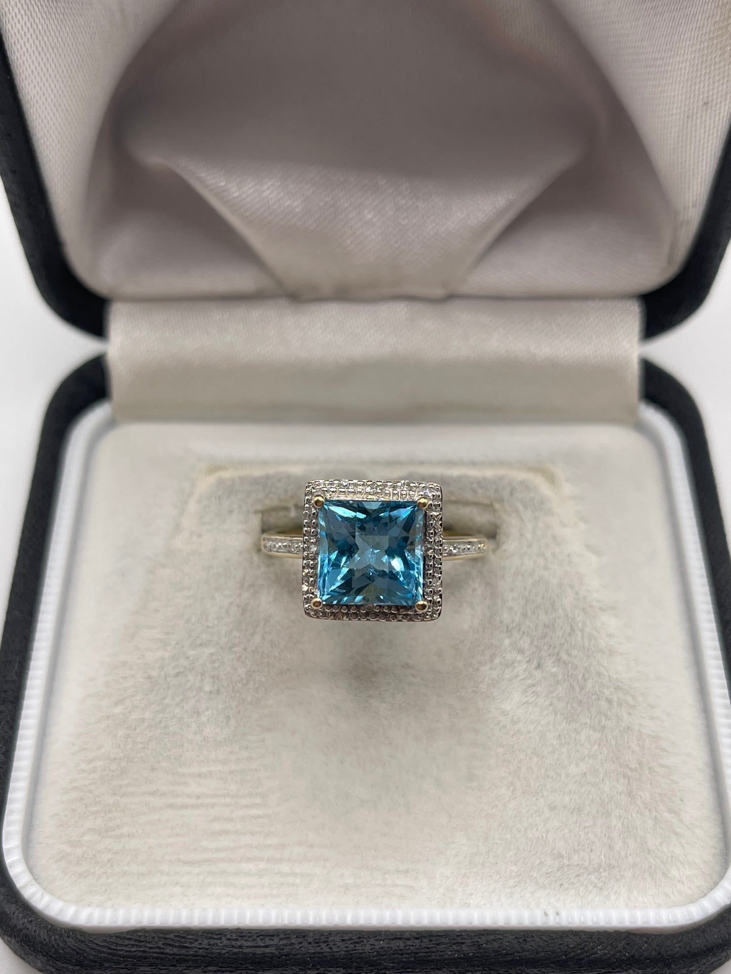 9ct gold blue topaz and diamond ring