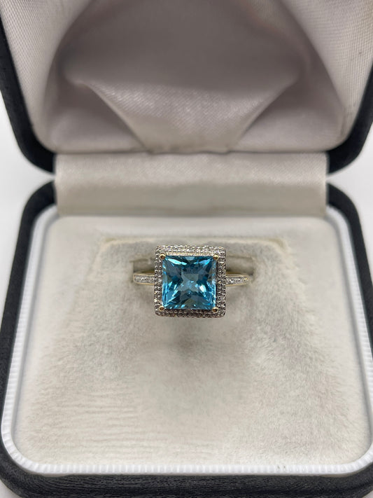 9ct gold blue topaz and diamond ring