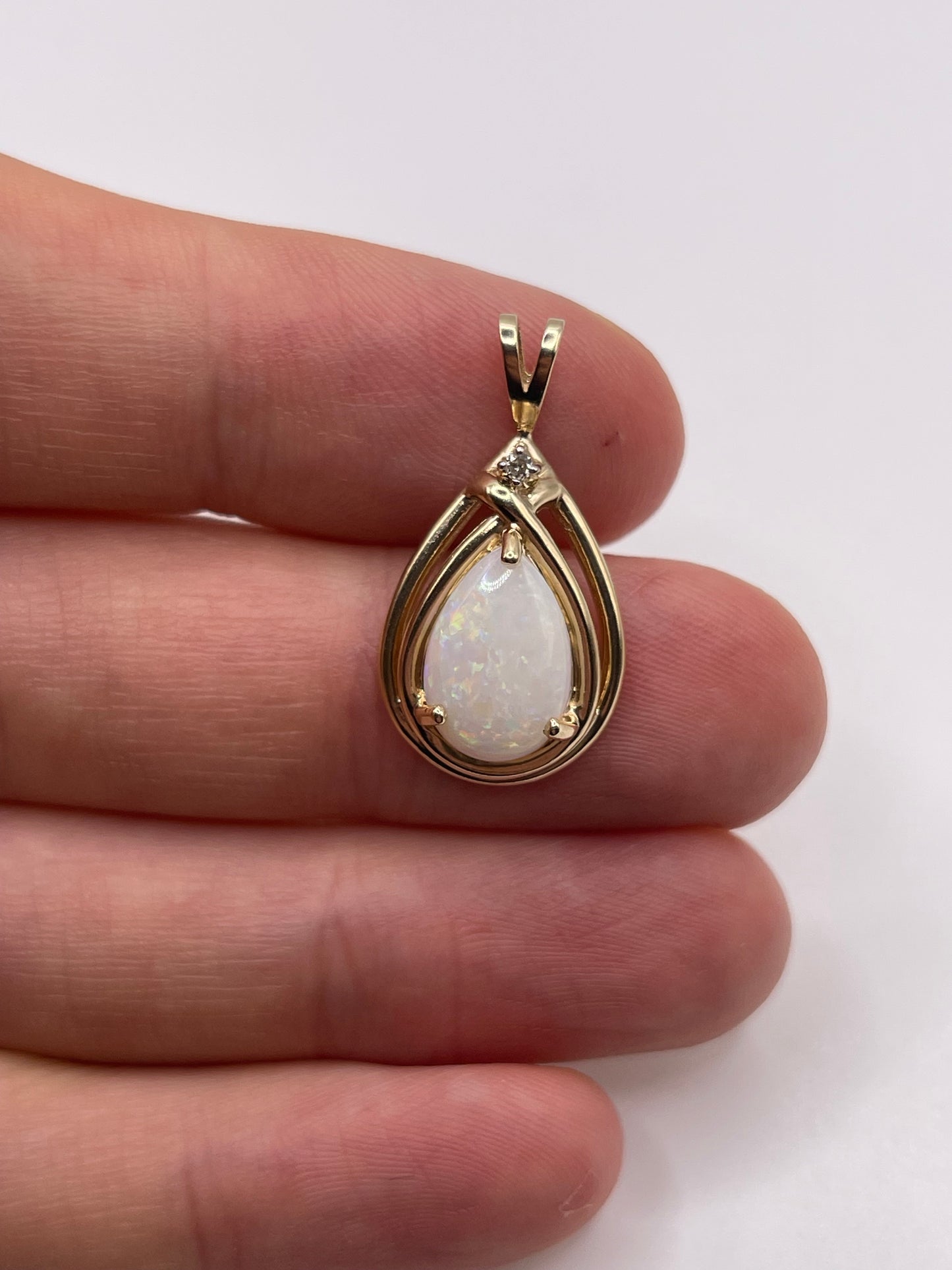 9ct gold opal and diamond pendant