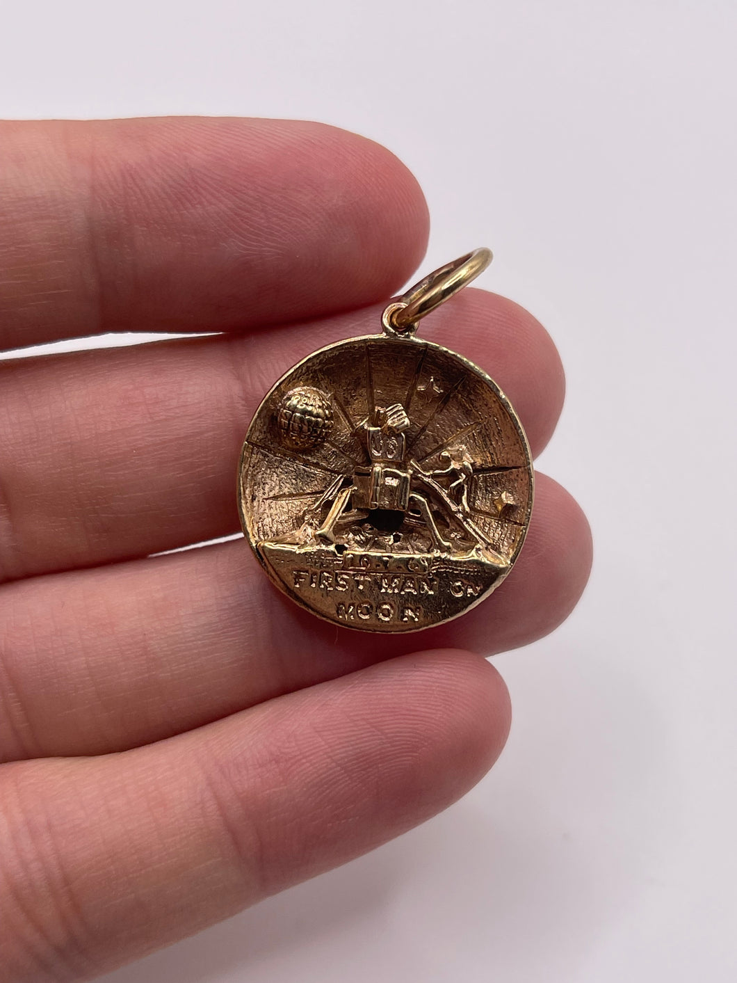 9ct gold first man on the moon pendant