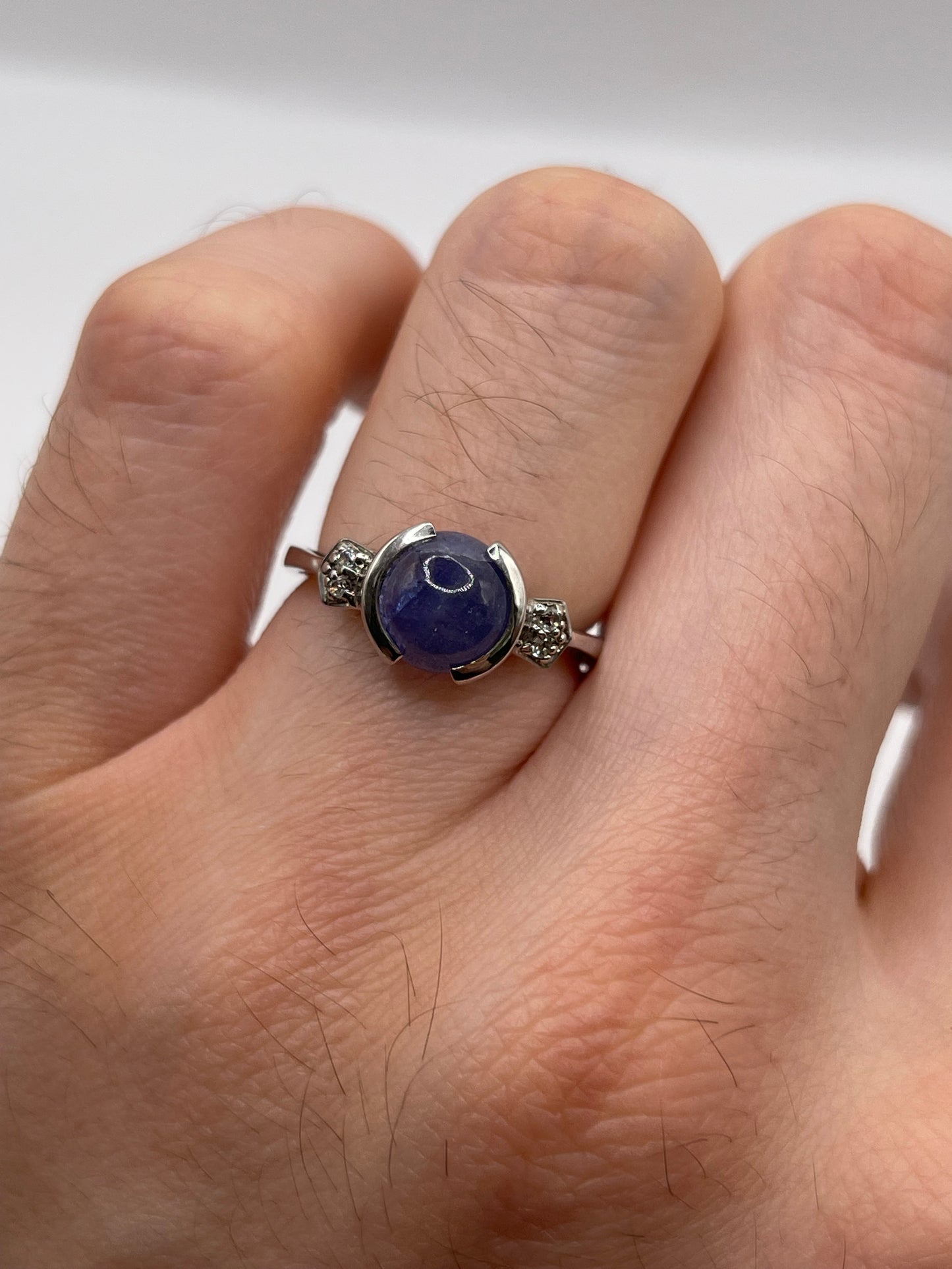 Silver cabochon tanzanite ring