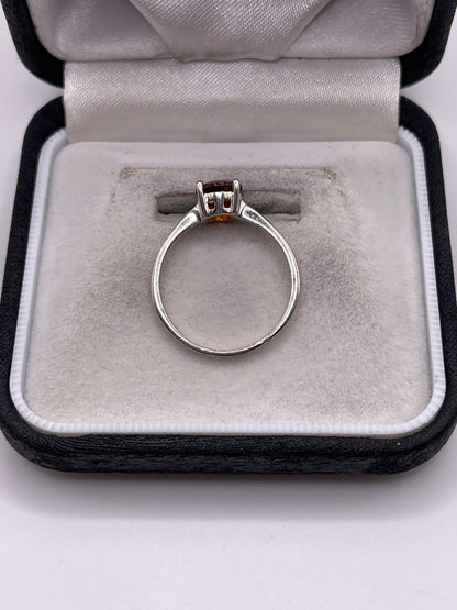 Silver topaz ring