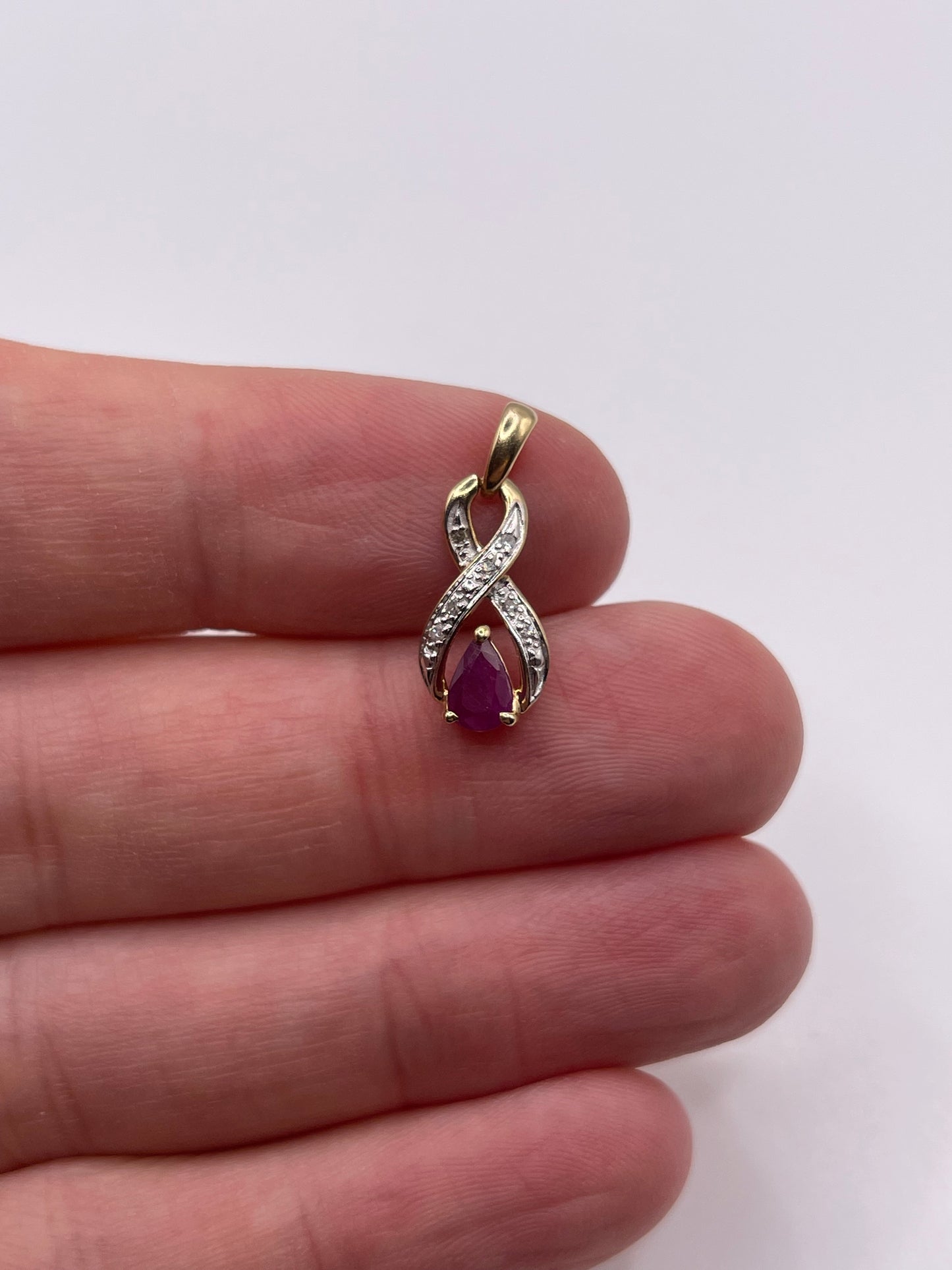 9ct gold ruby and diamond pendant