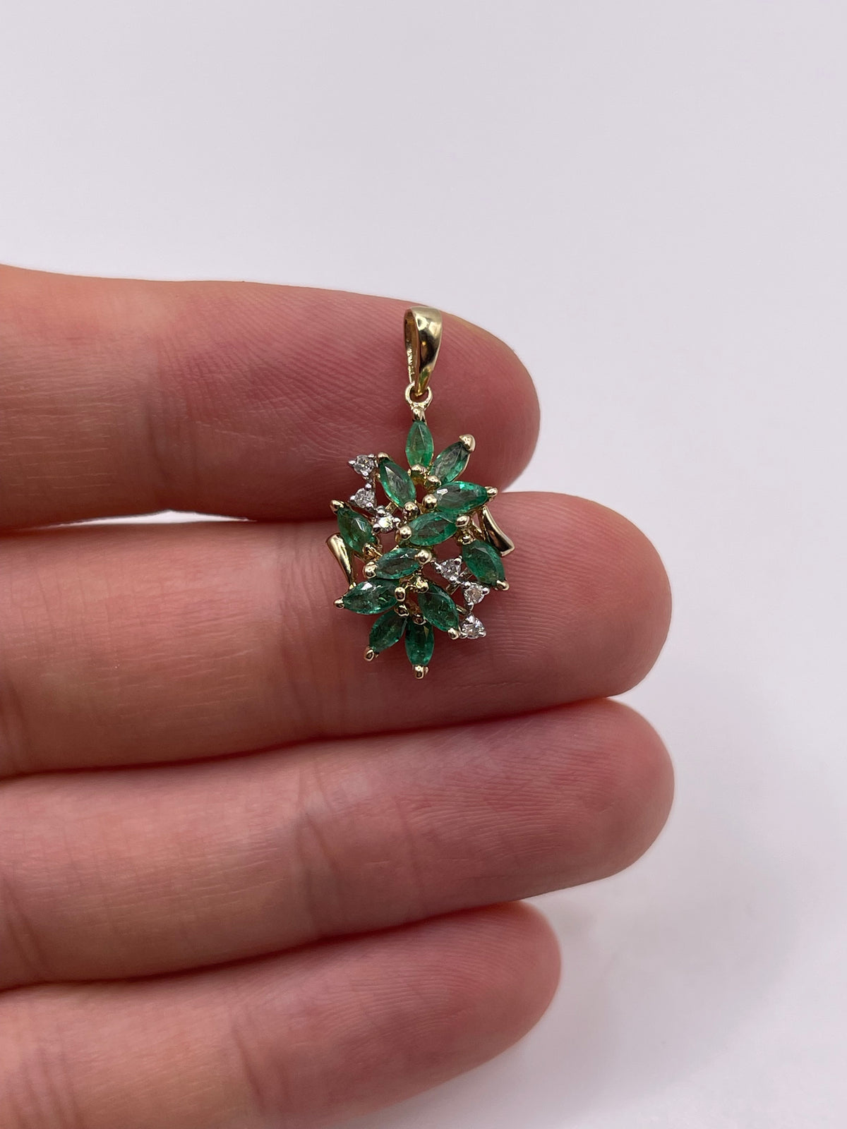 9ct gold emerald and diamond pendant