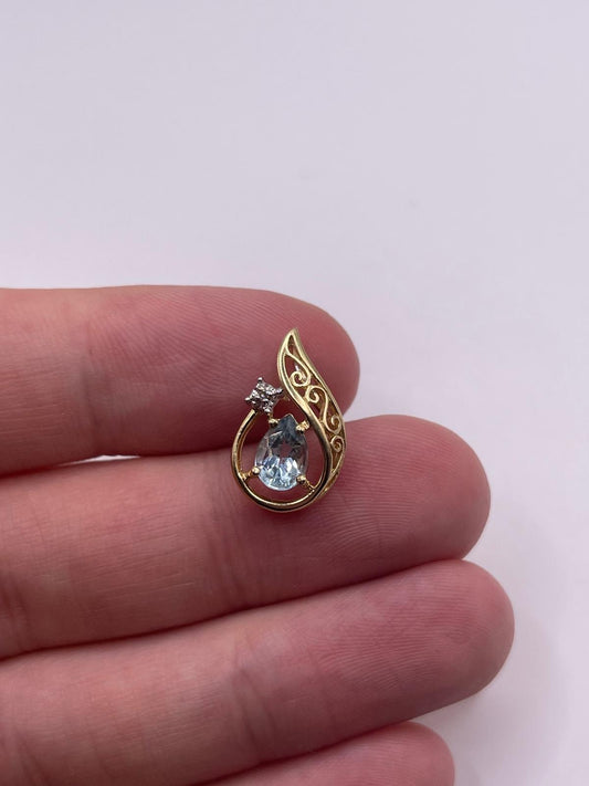 9ct gold blue topaz and diamond pendant