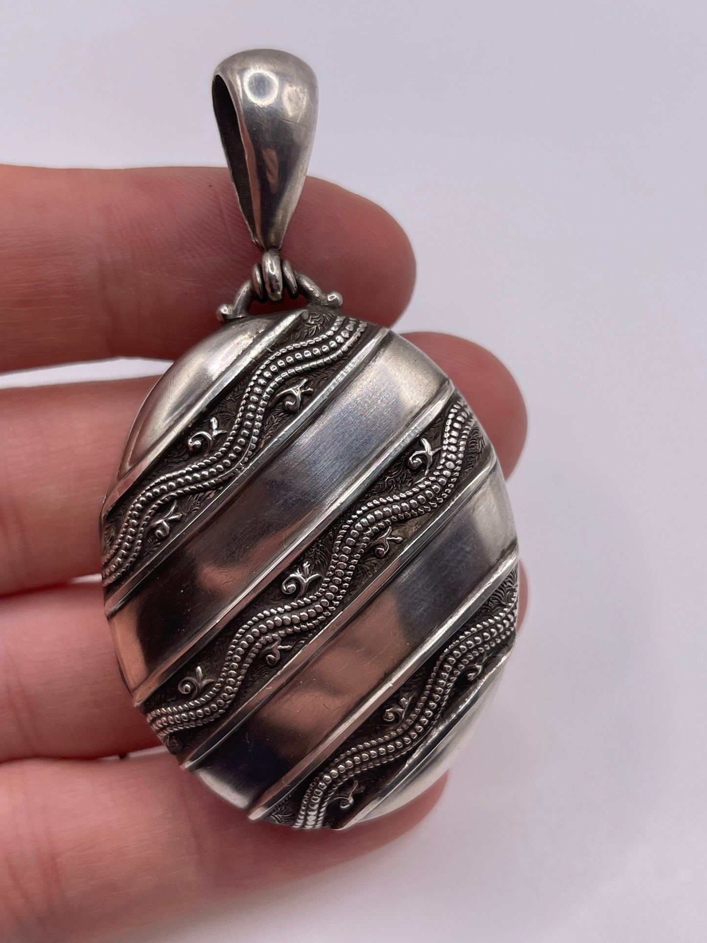 Antique 19th century silver locket pendant