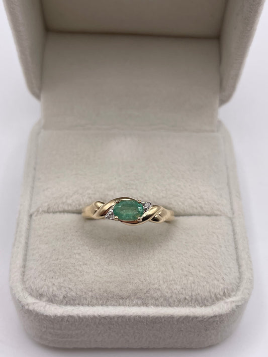 9ct gold emerald and diamond ring