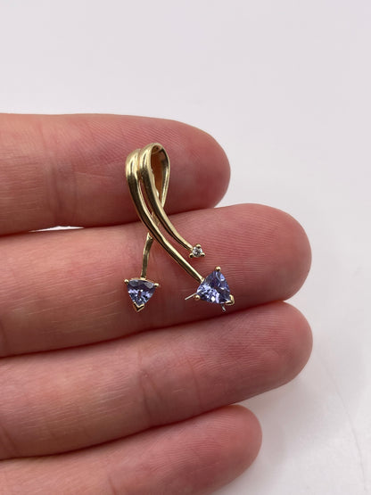9ct gold tanzanite and diamond pendant