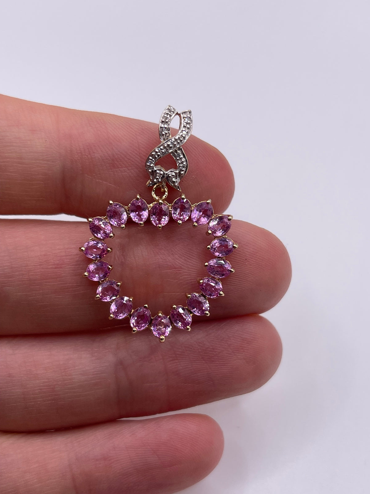 9ct gold pink sapphire and diamond pendant