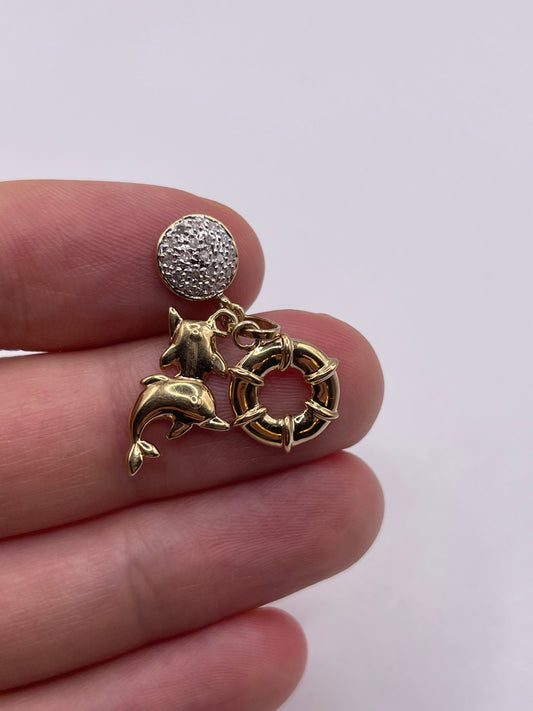 9ct gold diamond, dolphin and lifebuoy charm