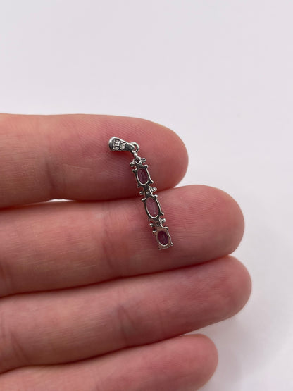 9ct white gold tanzanite and diamond pendant