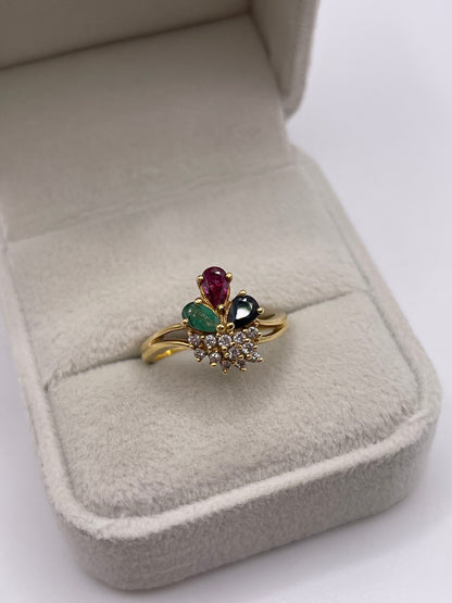 18ct gold ruby, sapphire, emerald and diamond ring