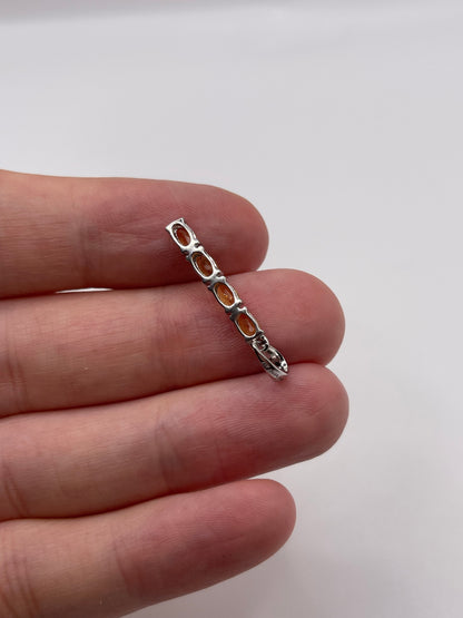9ct white gold orange sapphire pendant