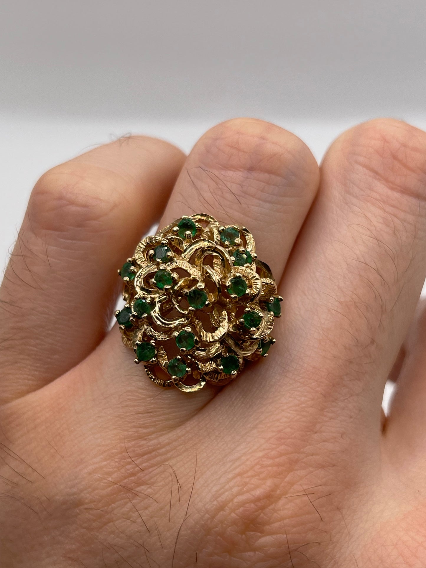 Heavy 9ct gold emerald cluster ring