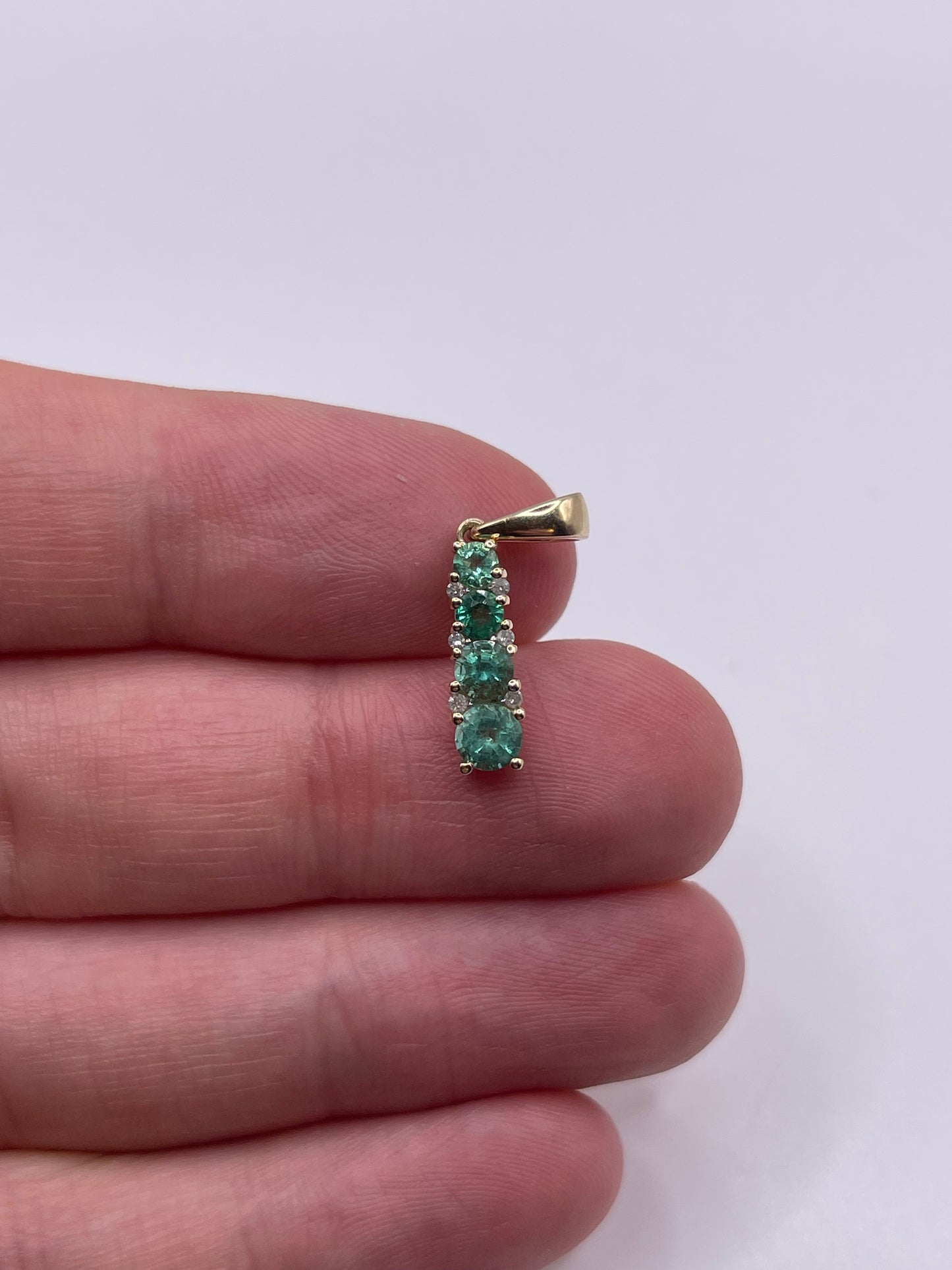9ct gold emerald and diamond pendant