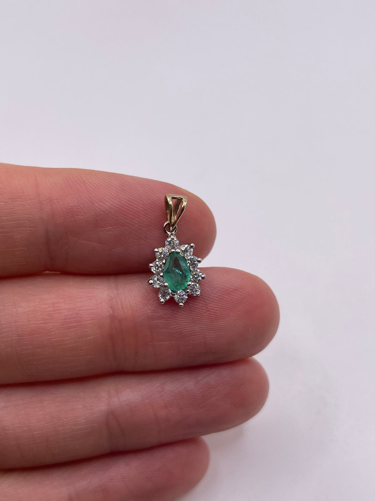9ct gold emerald and cz pendant