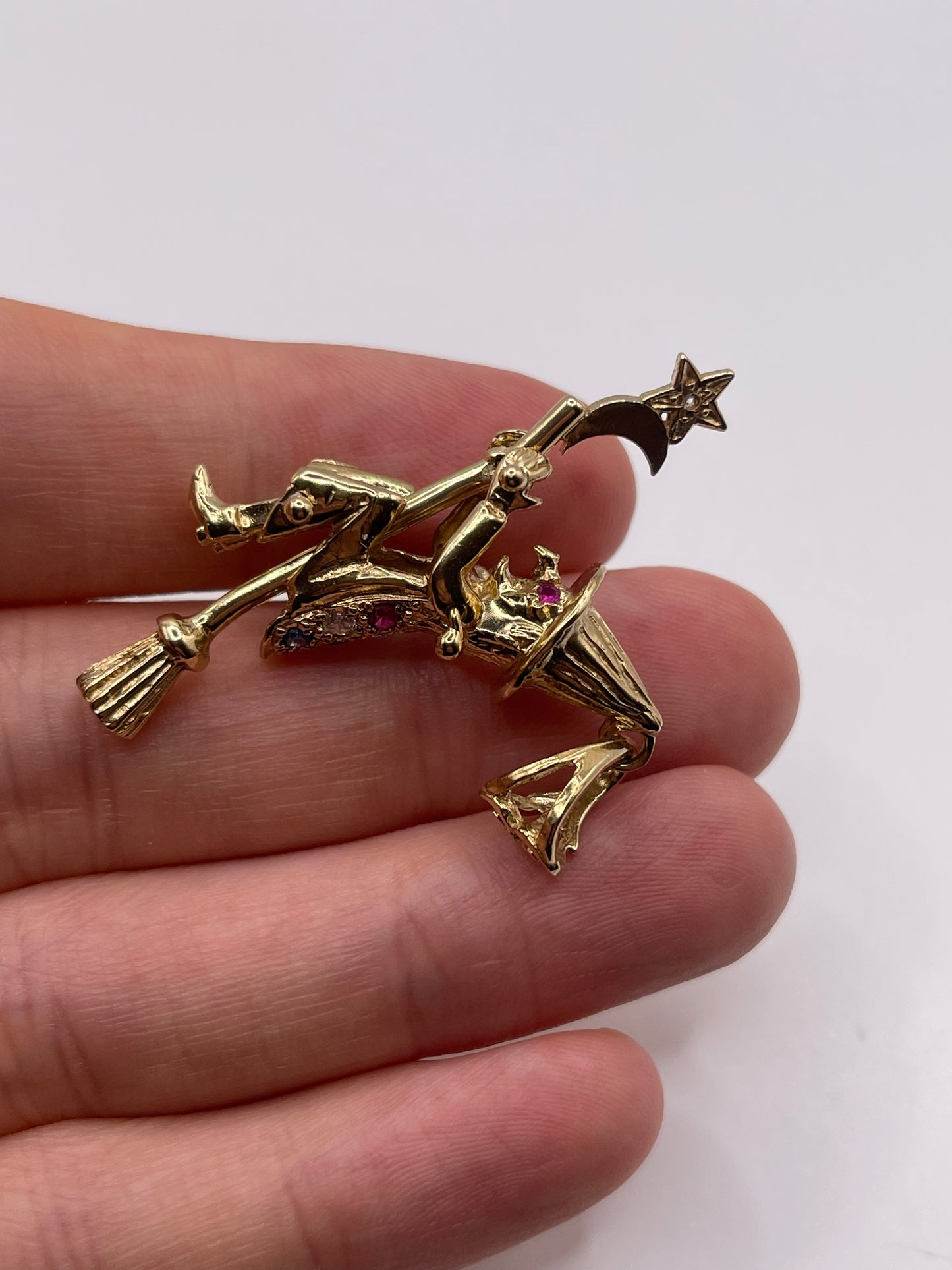 9ct gold articulated witch pendant