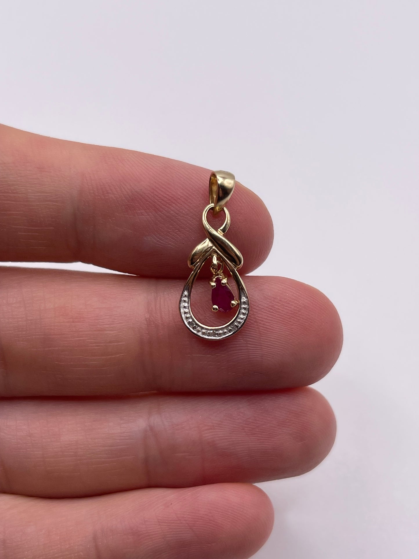 9ct gold ruby and diamond pendant