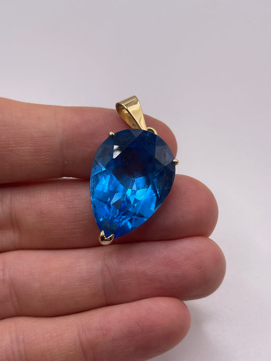 14ct gold note topaz pendant