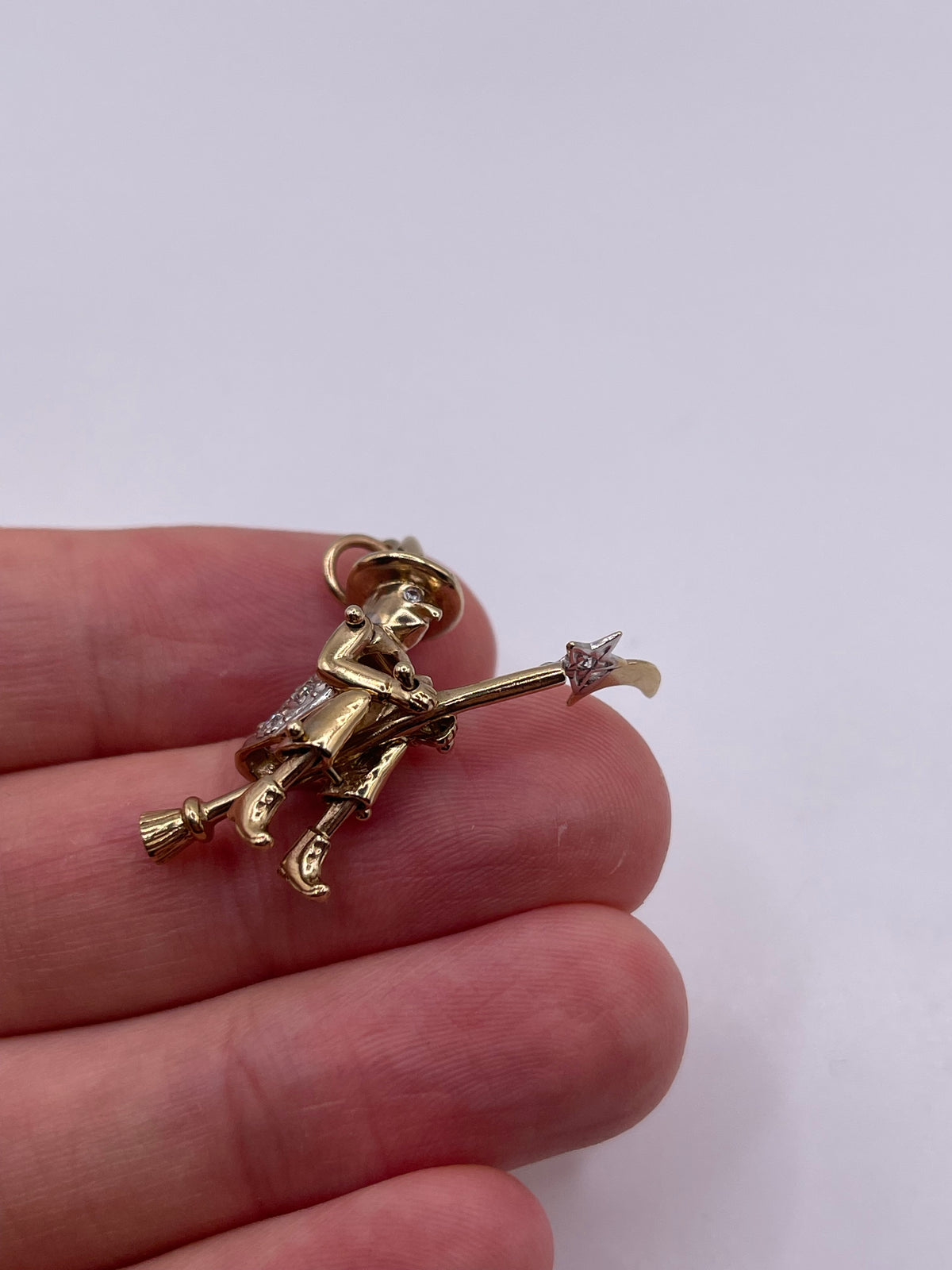 9ct gold cz articulated witch pendant