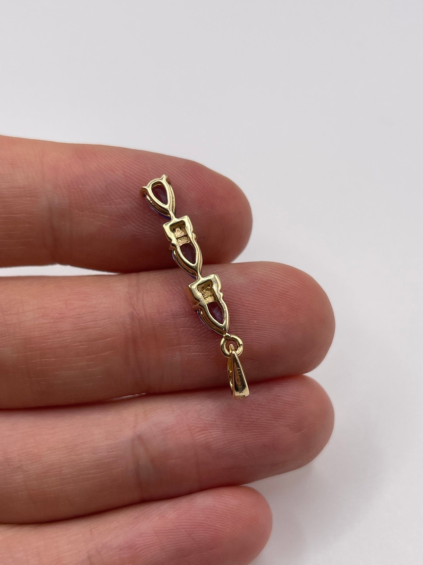9ct gold tanzanite and diamond pendant
