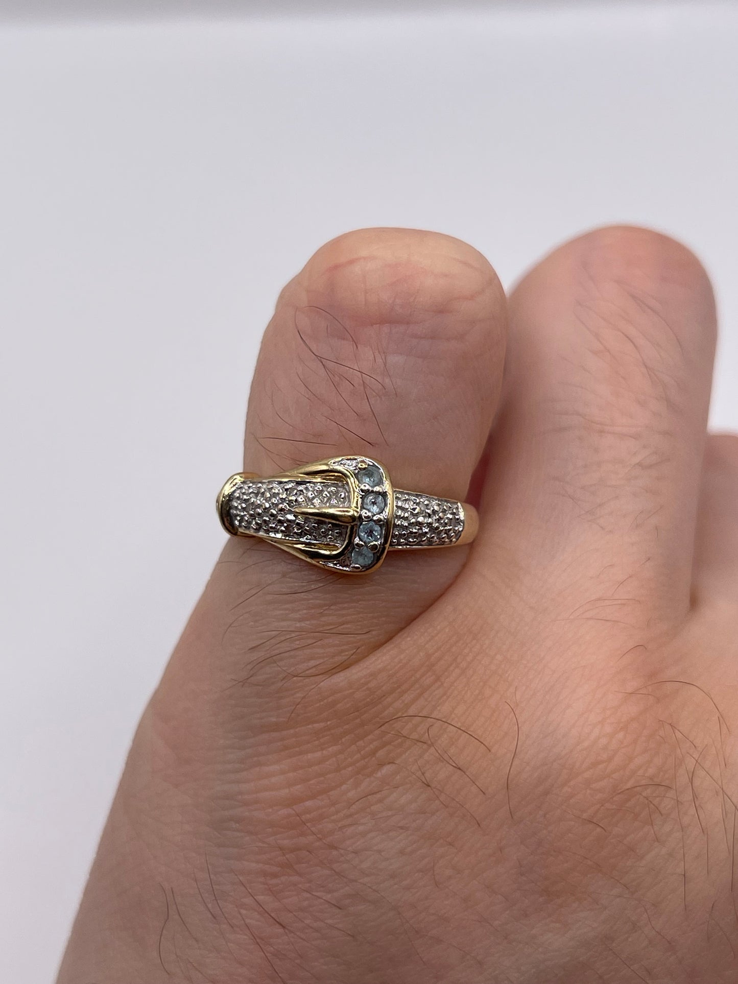 9ct gold topaz and diamond buckle ring