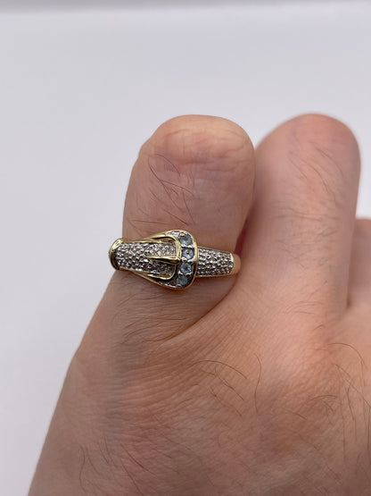 9ct gold topaz and diamond buckle ring