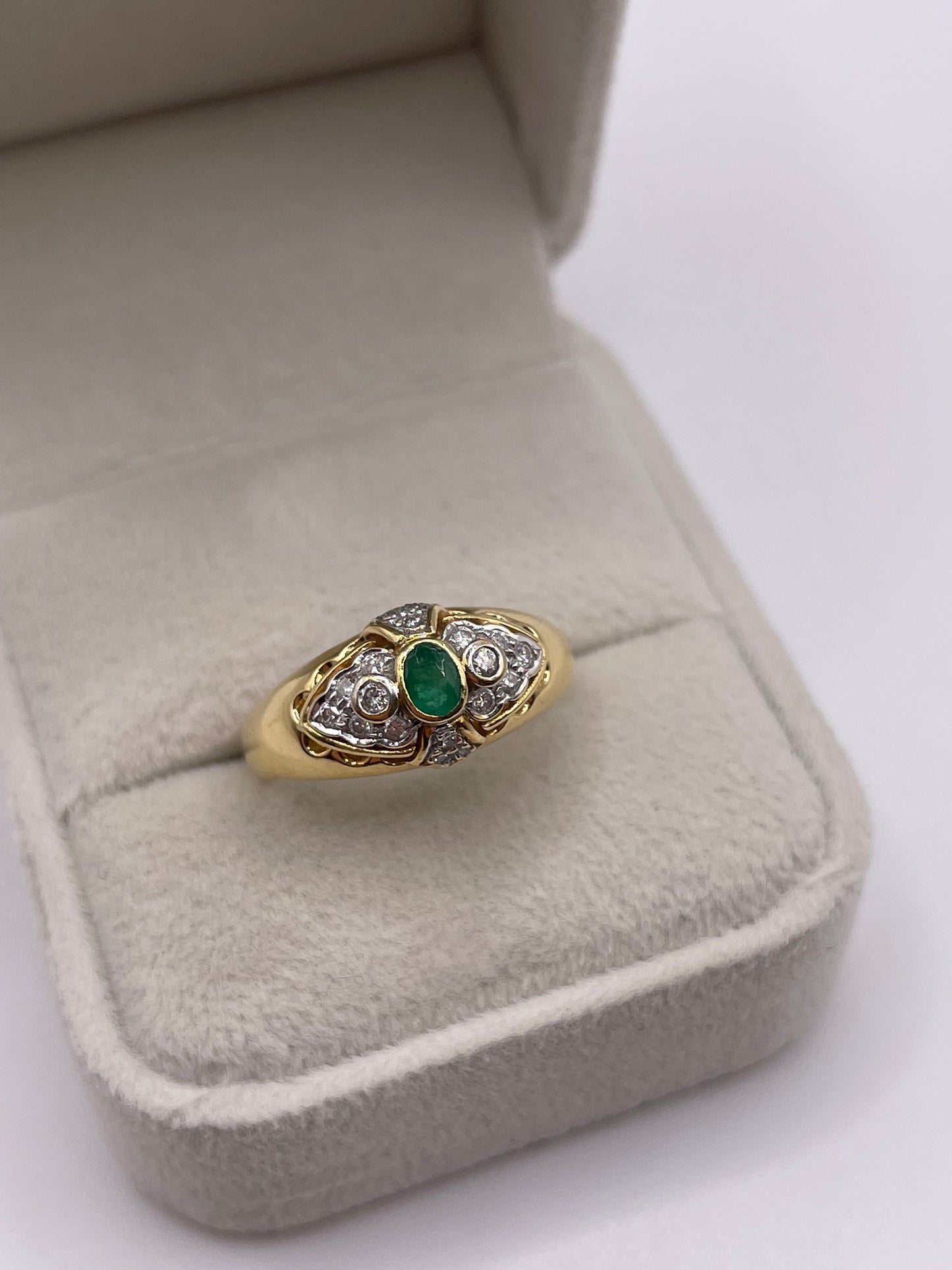 18ct gold emerald and diamond ring