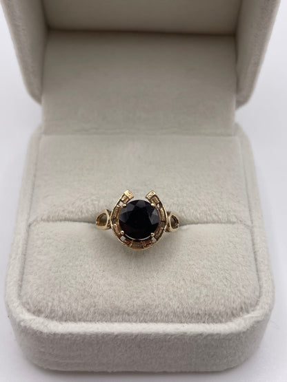 9ct gold garnet horseshoe ring
