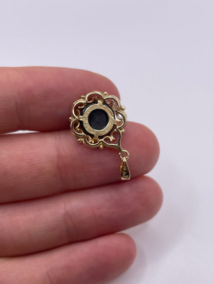 9ct gold onyx and diamond pendant