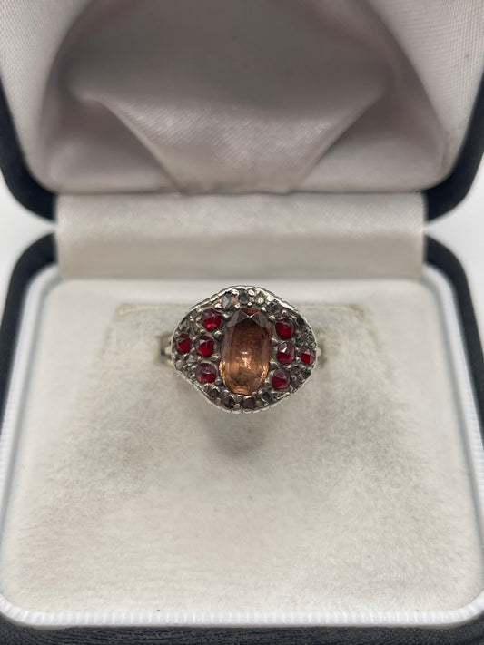 9ct gold and silver topaz, garnet and diamond ring