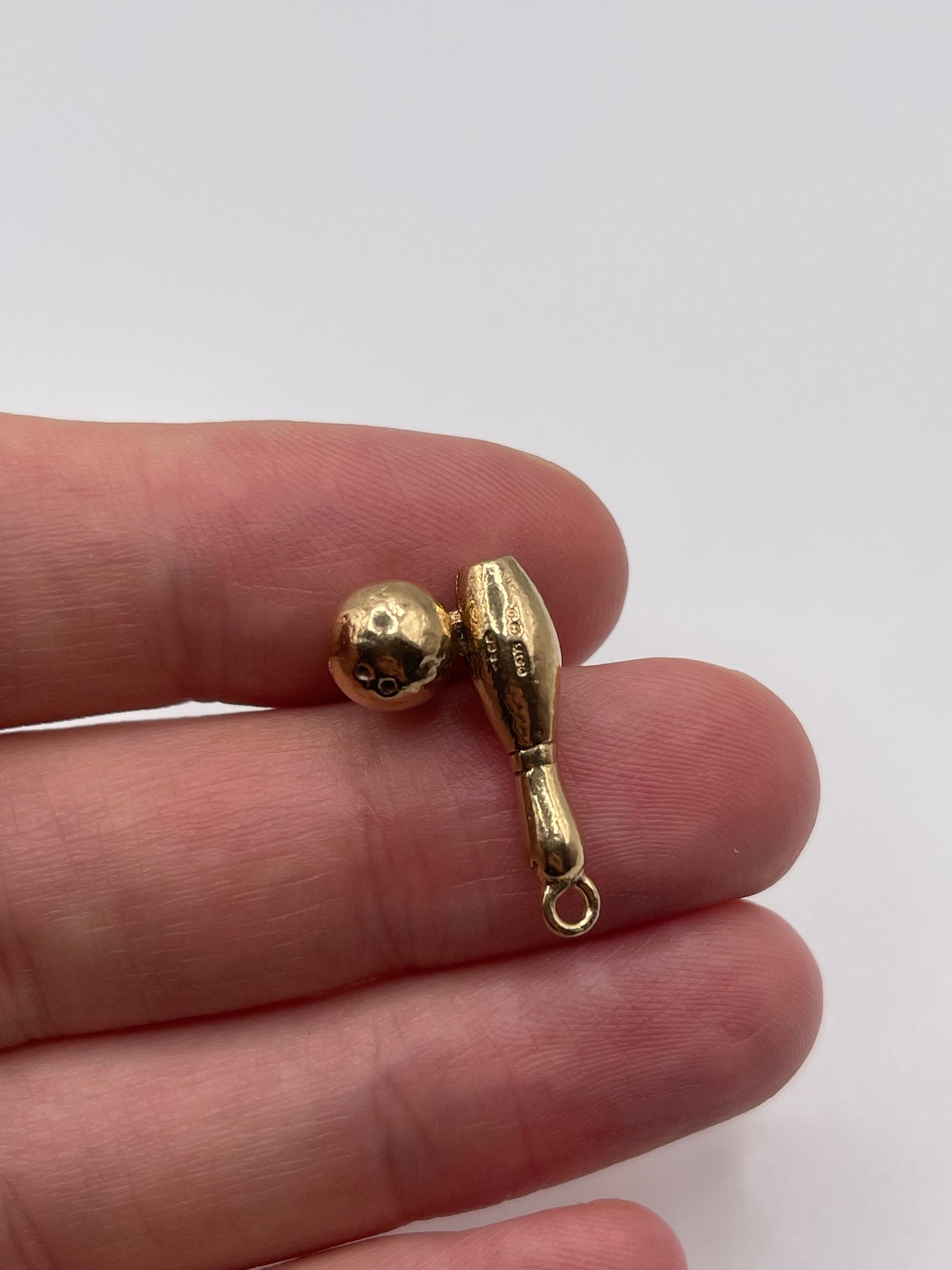 Heavy 9ct gold ten pin bowling pendant