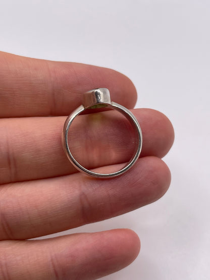 Silver peridot ring