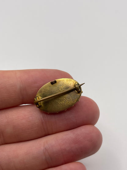 Antique 15ct gold cabochon amethyst brooch