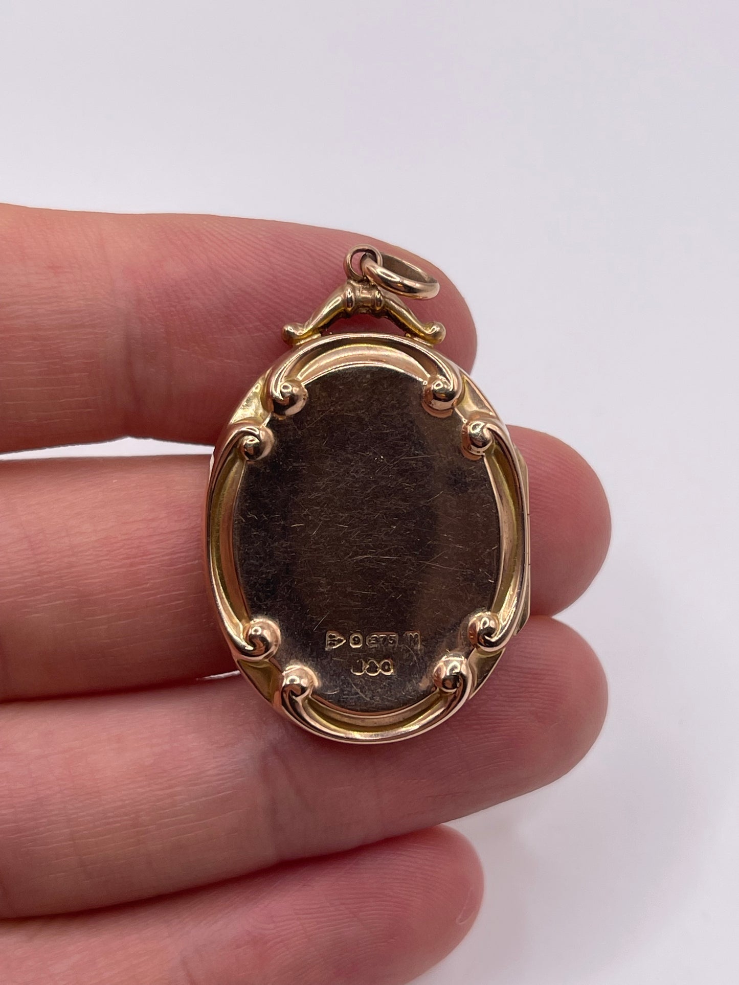 Antique 9ct rose gold garnet and pearl locket pendant