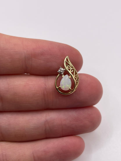 9ct gold opal and diamond pendant