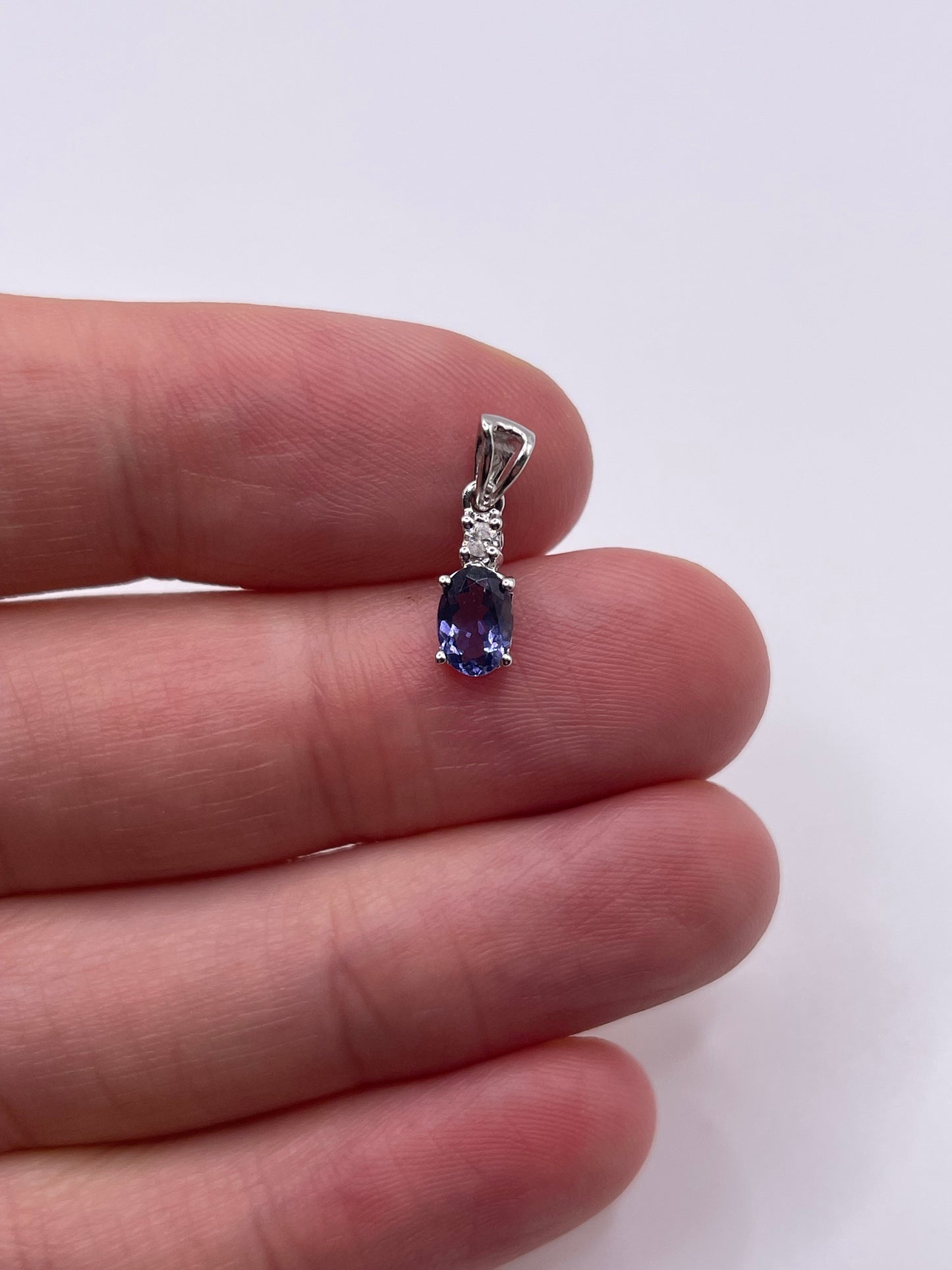 9ct gold tanzanite and diamond pendant