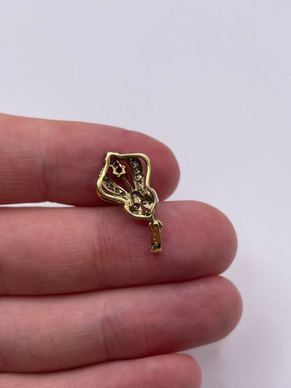 9ct gold ruby and diamond pendant