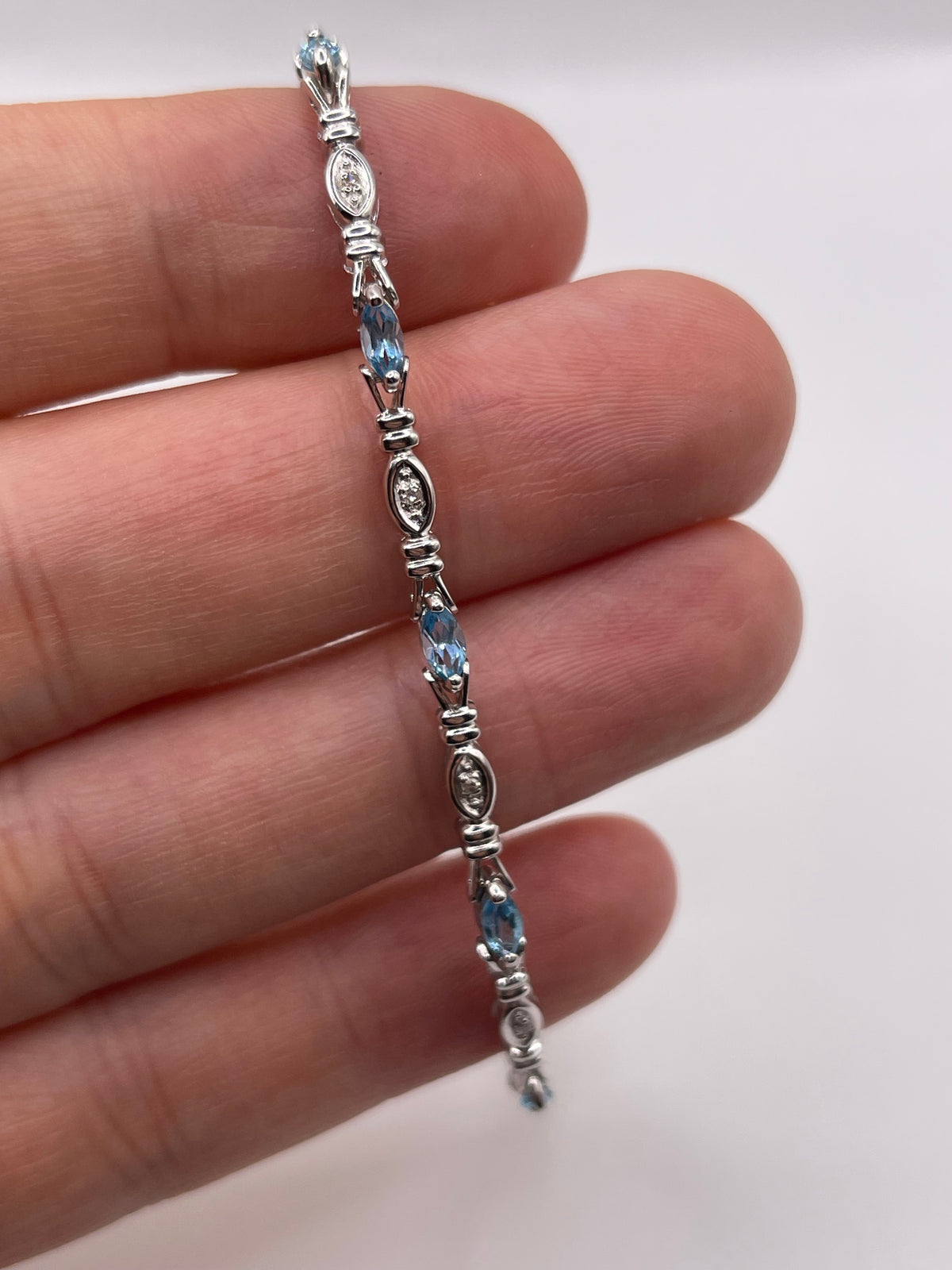 9ct white gold topaz and diamond bracelet