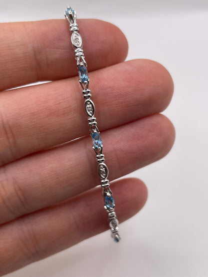 9ct white gold topaz and diamond bracelet