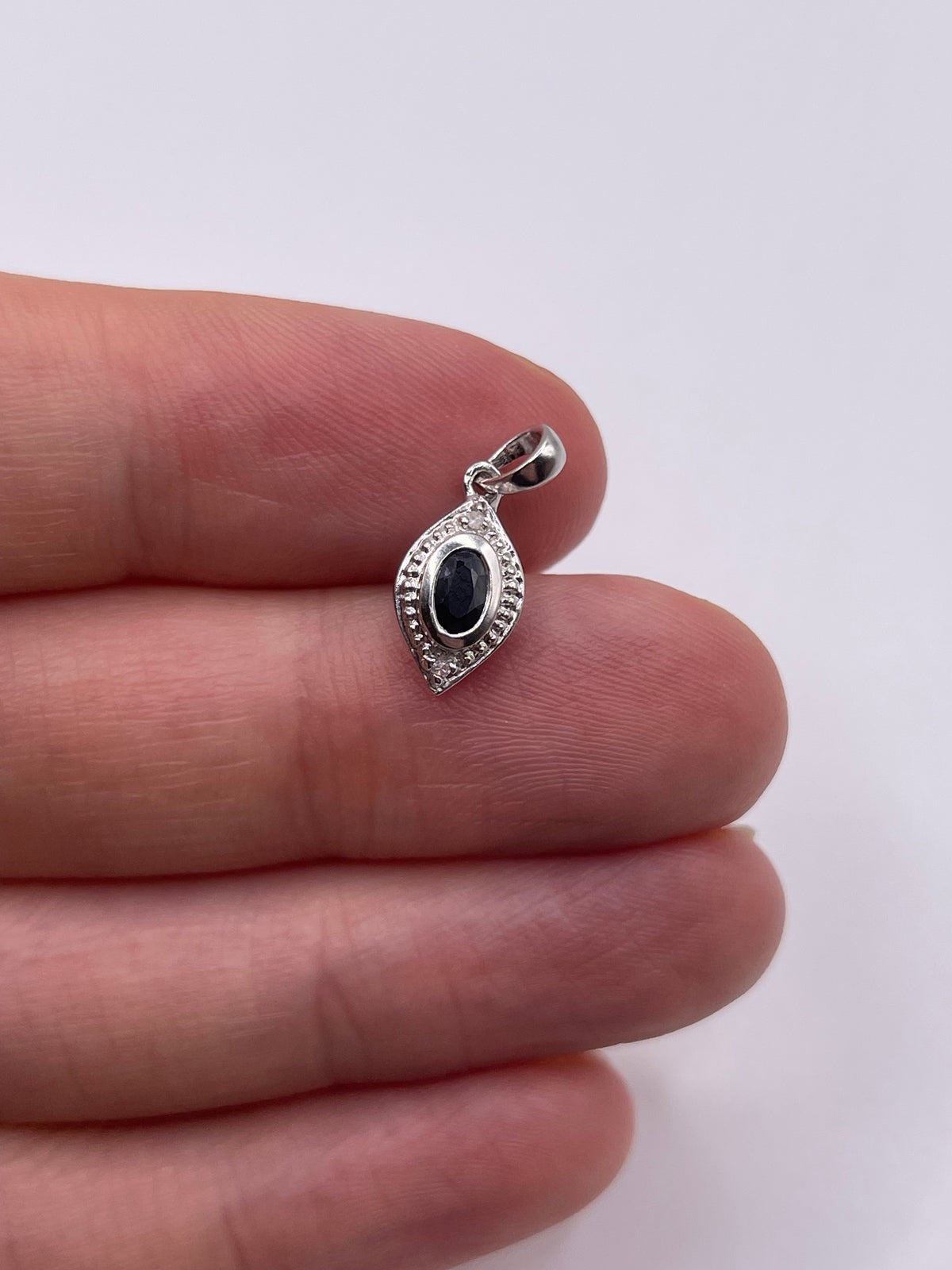 9ct white gold sapphire and diamond pendant