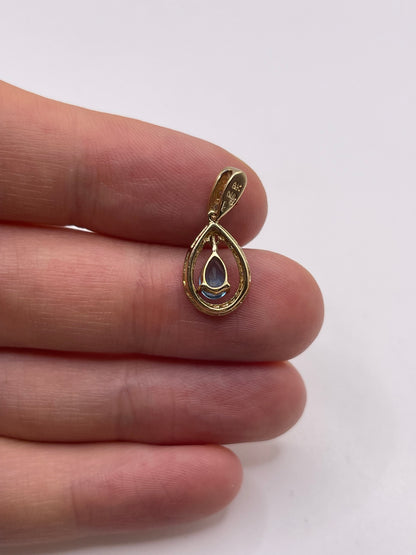 9ct gold topaz and diamond pendant