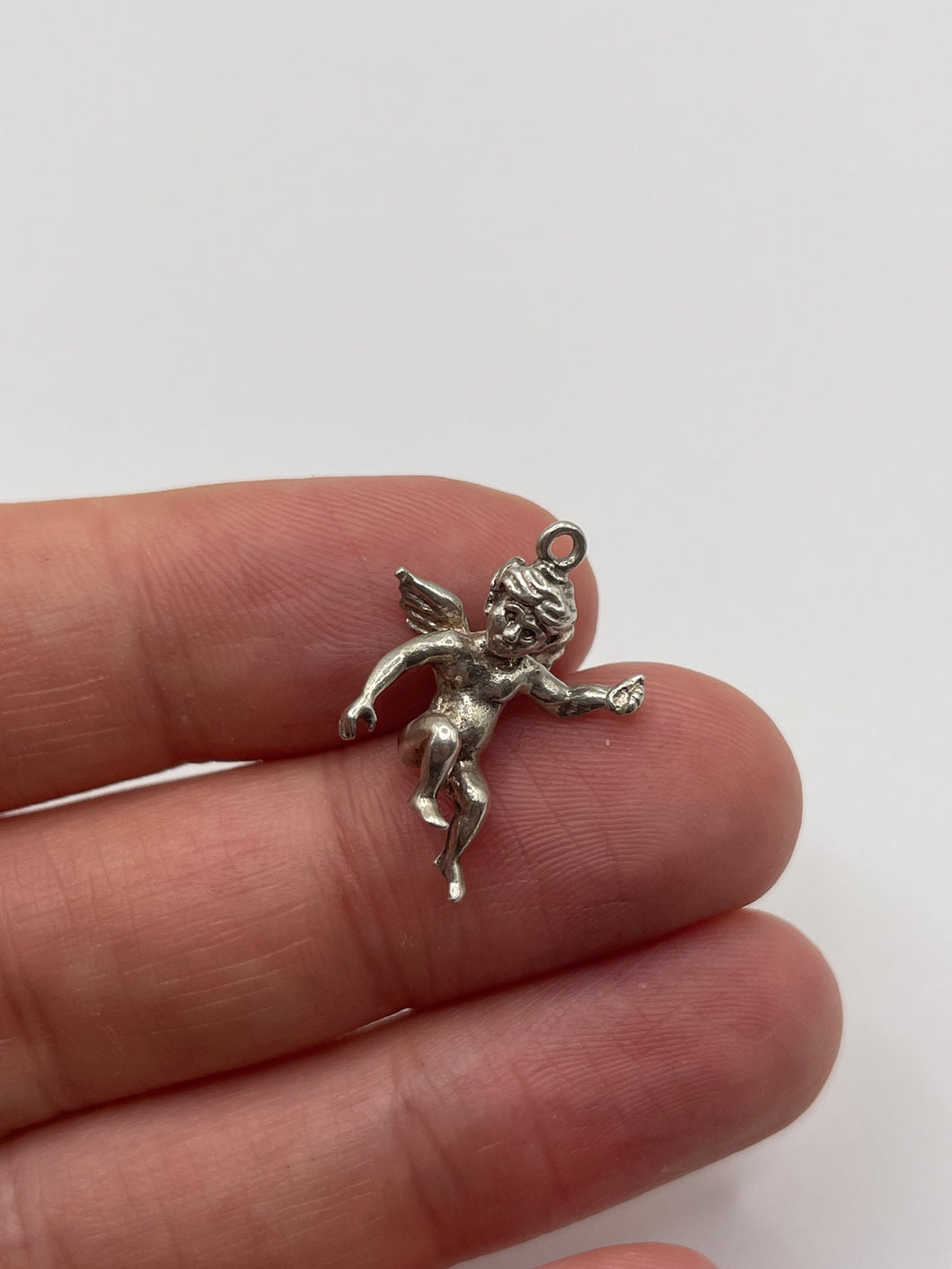 Silver cherub charm