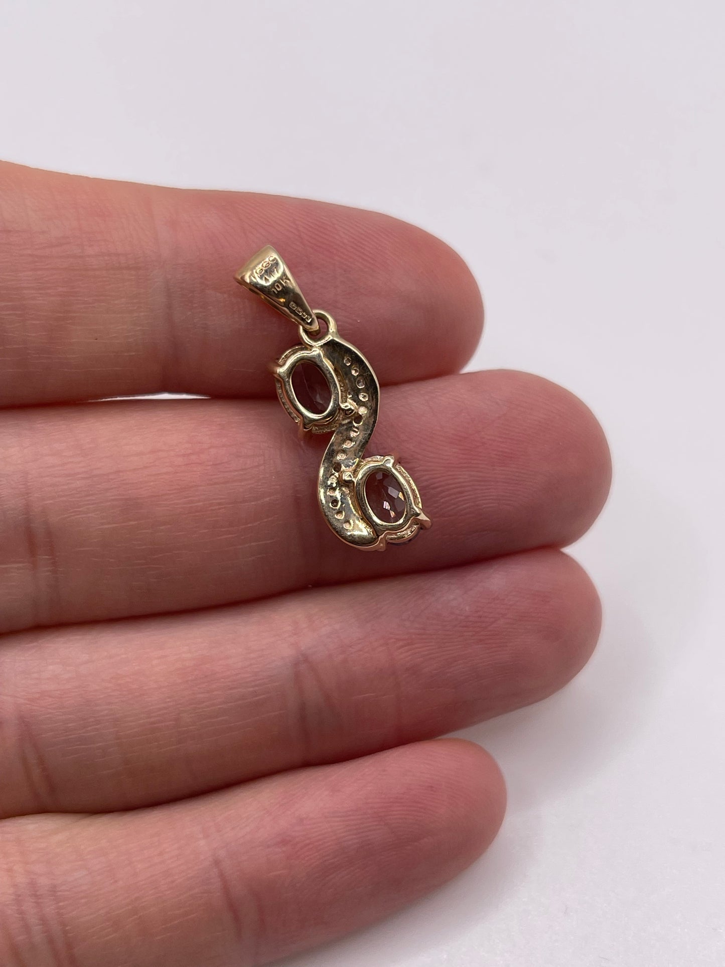 9ct gold tanzanite and diamond pendant