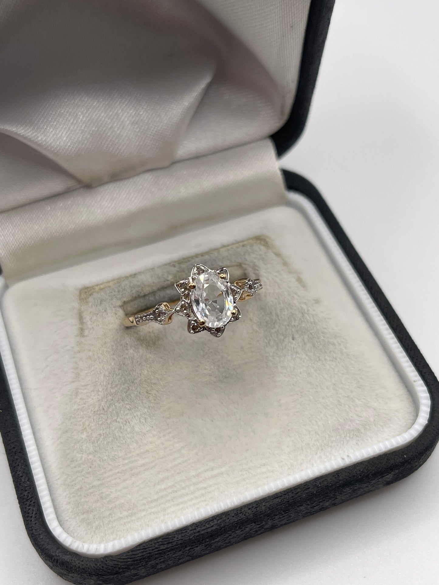 9ct gold zircon and diamond ring
