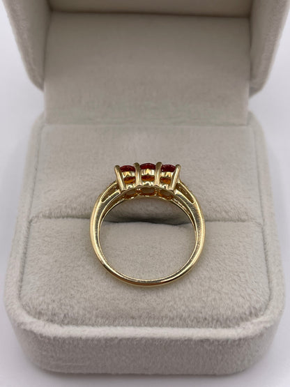 9ct gold orange sapphire and zircon ring