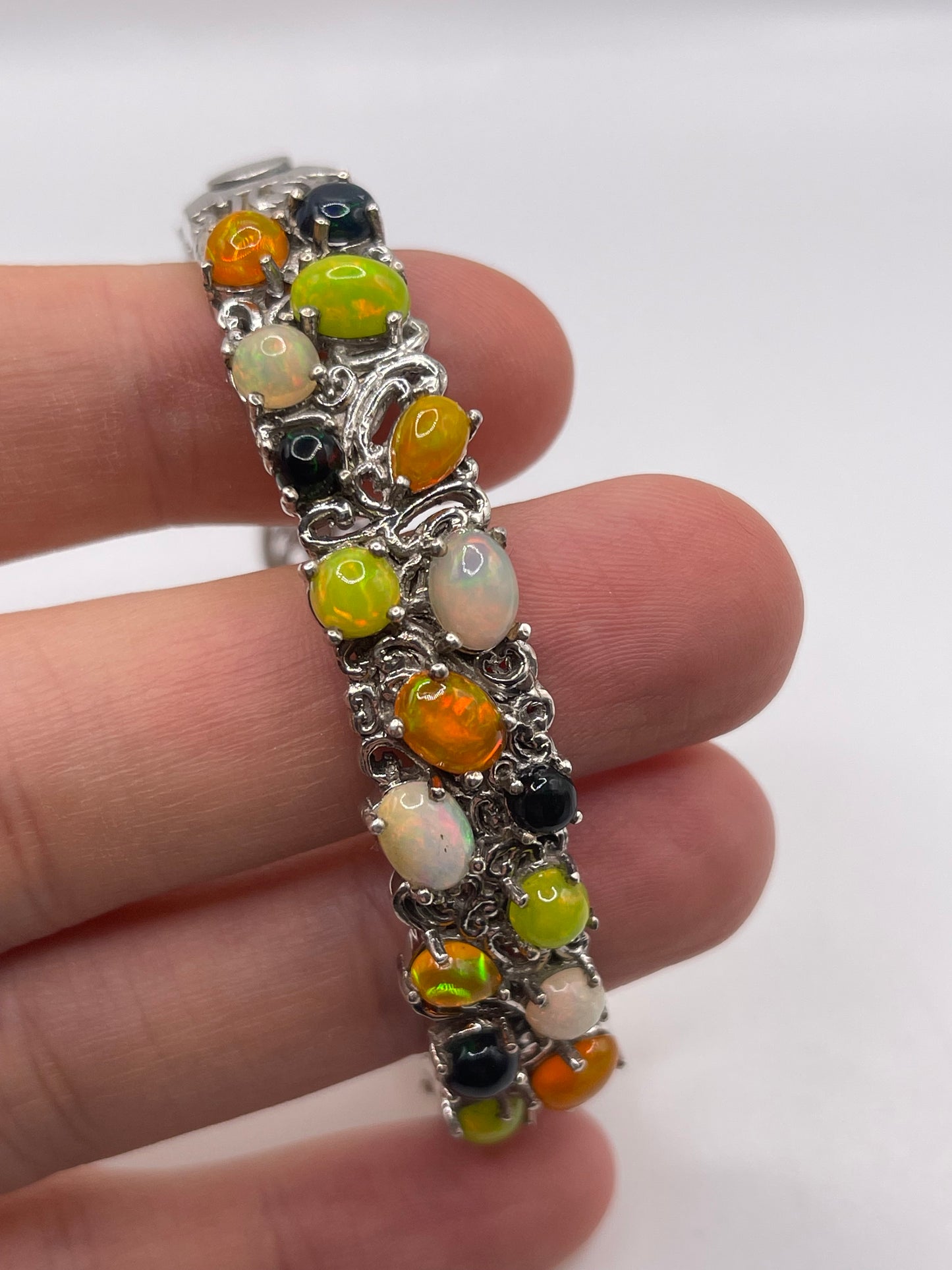 Heavy silver opal bangle