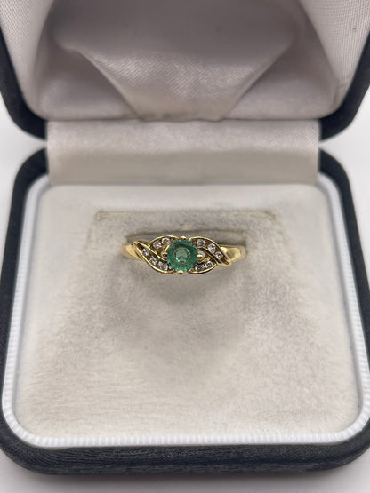 18ct gold emerald and diamond ring