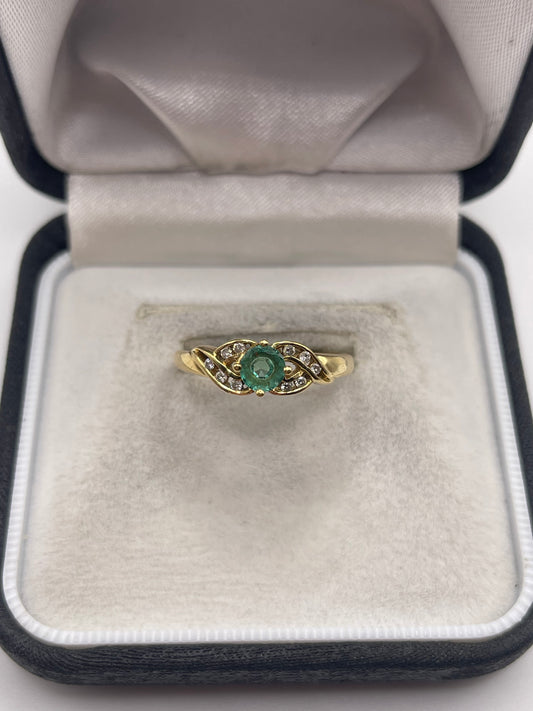 18ct gold emerald and diamond ring