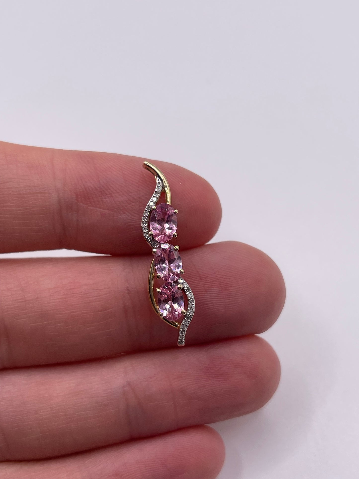 9ct gold pink sapphire and diamond pendant